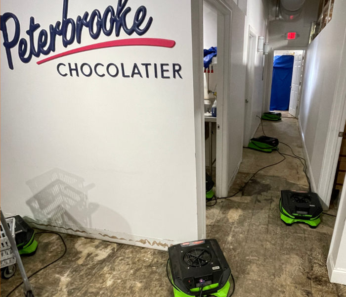 SERVPRO equipment placed in a commercial business to dry out water damage.